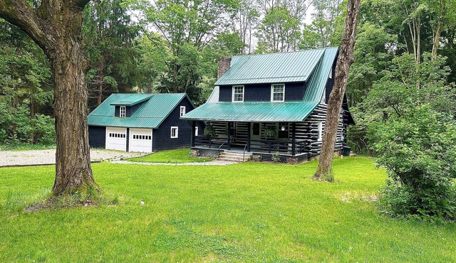 Original log cabin on 3 private acres