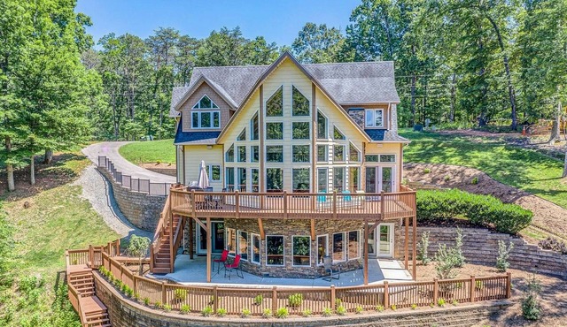 Osprey Cove - Custom Lakefront home with 2-story dock, Wifi, Game Room and Fireplace