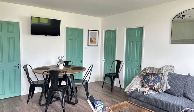 Our cosy chalet is just a 5-minute stroll from the golden sands of Camber Beach.