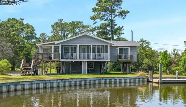Our Happy Place | Canal Front w/Private Dock, Huge Screened Porch + Pet Friendly Escape