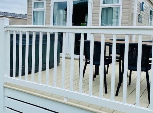 Our Kingfisher 34-4 persons with private hot tub-pet friendly-Tranquil holiday away from it all yet not far from St Austell- The Holiday Home has two bedrooms, living and dining area, equipped kitchen-Decking-outdoor furniture-Fishing lakes-Perfect