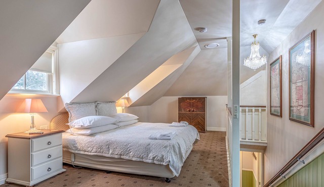 Our Loft sits above our Guest House main residence with balcony view