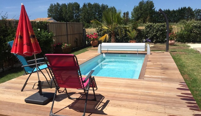 Our oasis of peace with heated pool, just a 10-minute walk from the sea.