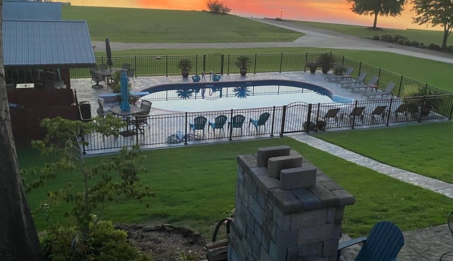 Outdoor family time on the patio, at the pool-pool house, or on the boat dock!