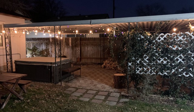 Outdoor fireplace, hot tub, coffee bar. Close to green belt and downtown