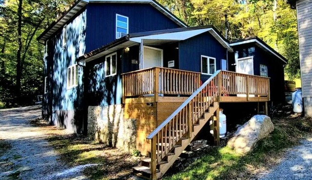 Outdoor hot tub & indoor soaking tub, bonfire pit, picnic area, foosball & more