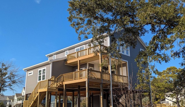Outdoor living at its best with new construction, pet friendly and water views