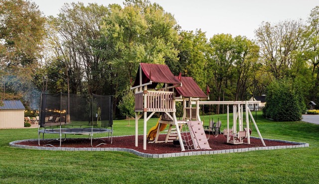 Outdoor Oasis with pickleball, swimming pond, basketball, shuffleboard & pavilion with kitchen