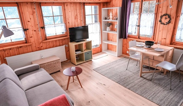 Outside: Ground floor flat for 2 persons, private garden with garden furniture and nice view, shuttl
