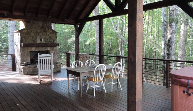 Outside party deck w/fireplace on Fightingtown Creek!