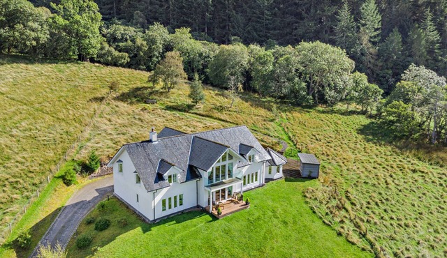 Overlooking Loch Ness, a luxury holiday home accommodating 12 adults