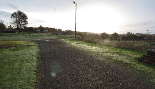 Overnight parking by horse barn in your RV or van.