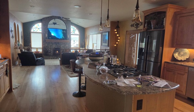 Oversized three car garage, huge barn,n beautiful pond, grill on upper deck.