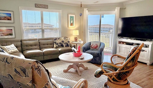 OW 3201-Flirty Flamingo: Oceanview condo in Oak Island, sleeps 10, pet-friendly.