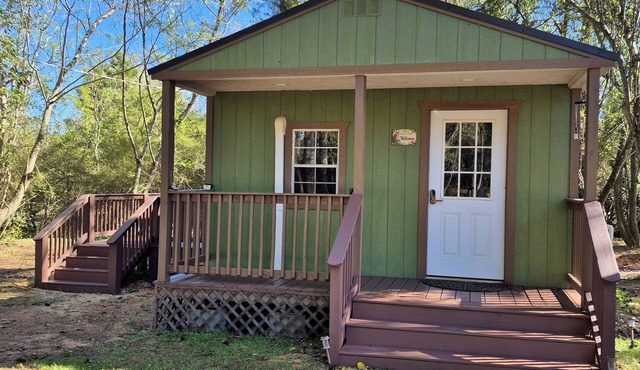 Owl's Nest, a rustic tiny house located 3.5 miles off I-65 in Evergreen, Alabama