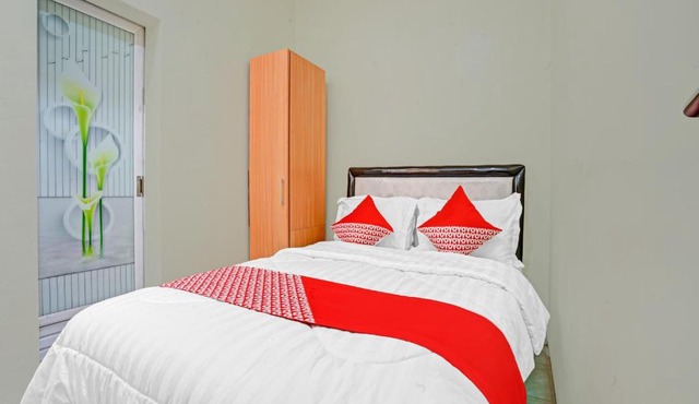 OYO 90804 Oma Uti Homestay Syariah