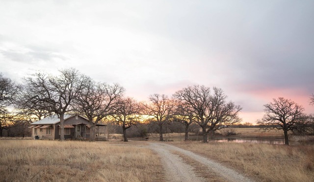 P.T. Cabin provides a private pond & stars included! 5 mins to Jacksboro, Tx.