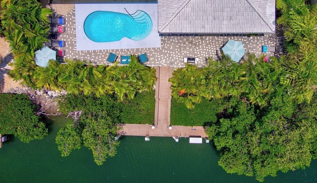 P27 - Private Beach Access! Pool home with everything you need for an unforgettable vacation. 3 bedroom 2 baths with deep water dockage.