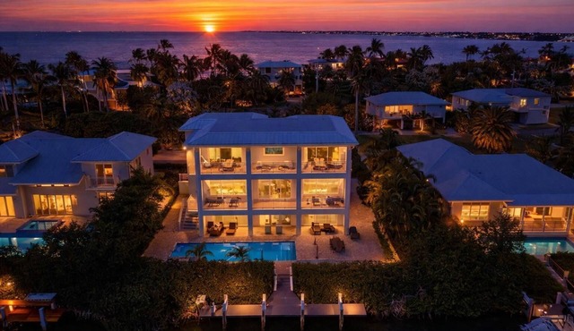 P70 - Stunning 5 bed, 5 bath home with dockage and oversized private pool in Key Colony!