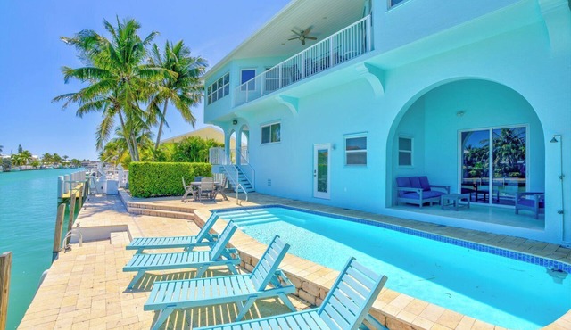 P71 - 7 bed, 6 bath up/down duplex in Key Colony!