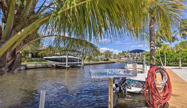 Palm City Canalfront Home with Boat Dock and Fire Pit!