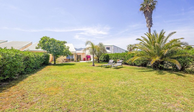 Palmeria - Maison climatisée, accès direct plage