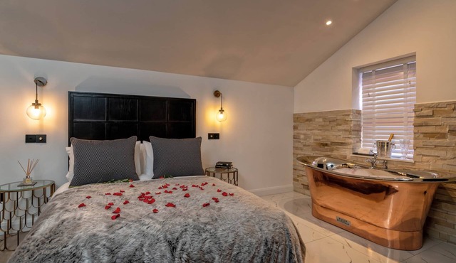 Pamper Yourself in our DOUBLE SIZED copper tub