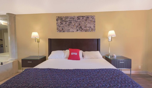Pamper Yourself in a King Room with Jetted Tub and Luxurious Brownsville Retreat