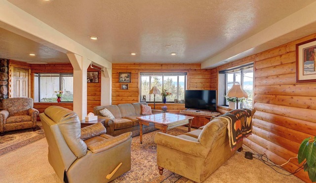Panorama | Sweeping Bighorn Mountain Views | Spacious 3-Bedroom Walk-Out Retreat | Renovated Spa Bathroom | Western Living Room with Log Accents | Sheridan Wyoming Vacation Rental