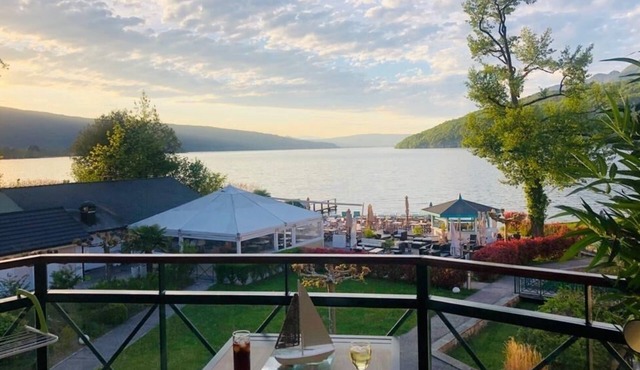 Panoramic view Bay of sails Feet in the water ANNECY DUINGT LAKE