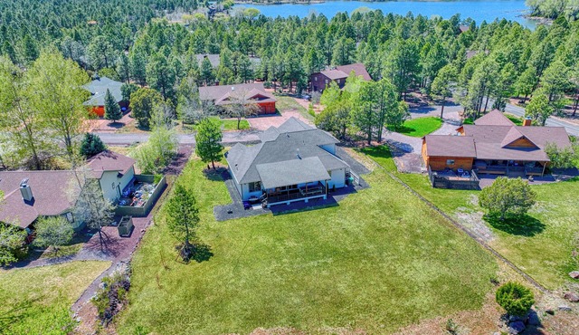 Papa's Place - Modern Rainbow Lake Home w/AC, Game Room, Furnished Deck & BBQ