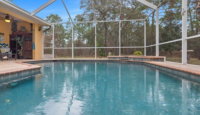 Paradise found! Private heated pool spa . 3700 sq ft of luxury on 2+ acres!