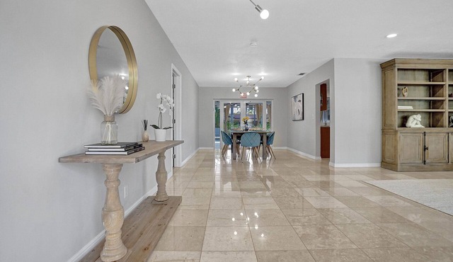 Paradise Garden Retreat near Hard Rock + Heated Pool + BBQ