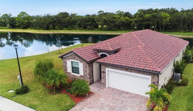 PARADISE MEETS PRIVACY WITH AMAZING WATER VIEW & HEATED POOL