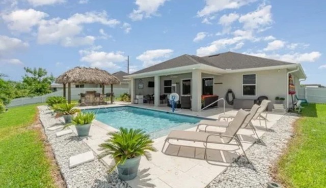 Paradise of Cape Coral on Canal, with Heated Pool, Tiki Hut Grill & Elec Bikes