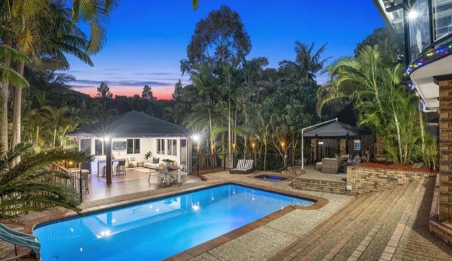 Paradise Retreat Resort Home with Waterfall & Pool on 2000m2