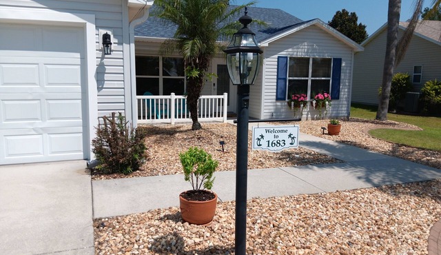 Paradise Village home in perfect golfing and recreation center location.