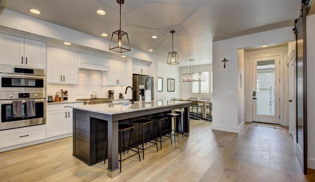 Park Place is a new, modern and sophisticated townhome in desirable Harris Ranch with use of community pool near Bown Crossing, Barber Park, Greenbelt and foothills trails, hike or float the river or ride the greenbelt from here