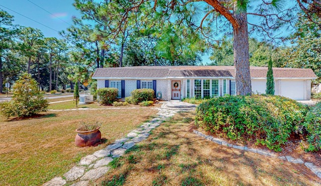 Parkside home with large yard, fireplace, sunroom, & W/D - near beach/downtown