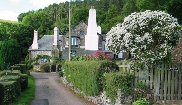 Parsonage Farm Stables, with stunning views down to the sea