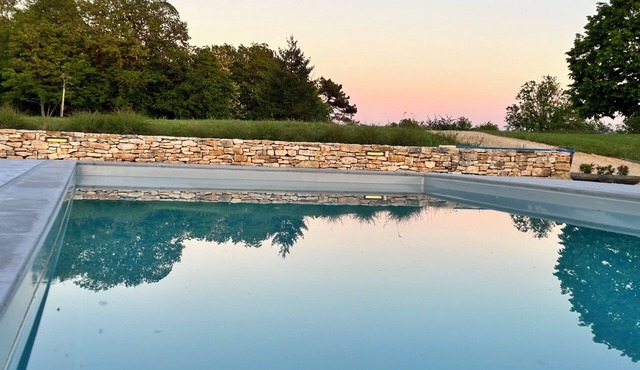 Peace, space and relaxation. We offer 2 guest houses with a salted water pool.nn