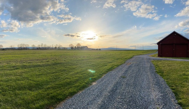 Peaceful. 1st Solar Glass Roofs Power generation producing farm USA, c2020.