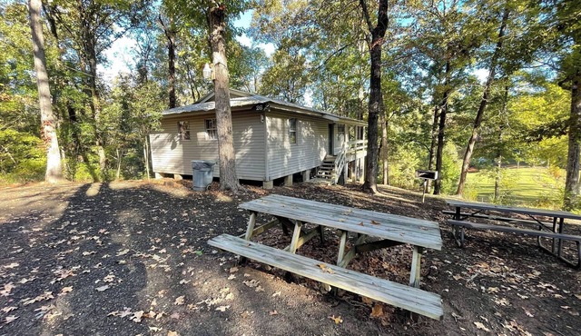 Peaceful 2-Bedroom Cabin with Full Kitchen, Pond View Porch & Outdoor Firepit