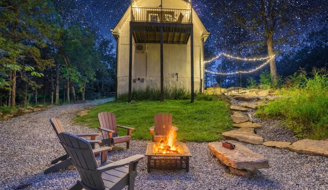 Peaceful 2BR Forest Cabin Near Ark W/Fire Pit, Deck & Vaulted Ceilings