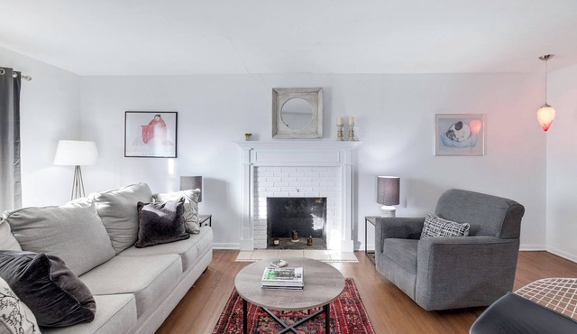 Peaceful 3-bedroom house in quiet neighborhood with mature trees.