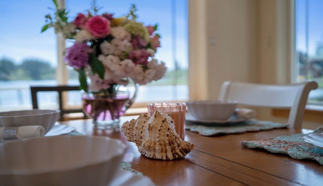 Peaceful 3BR lakeside home near the Oregon Coast with stunning views and cozy comfort.