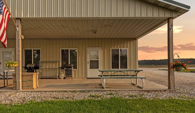 Peaceful 6-Bed River Cabin – Family-Friendly Getaway with Boat Slip & Playground Access | Sleeps 9