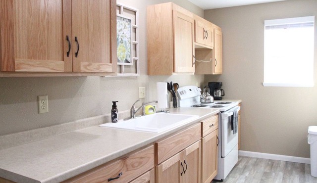 Peaceful and beautiful 2 bedroom 1 bathroom condo with full kitchen.