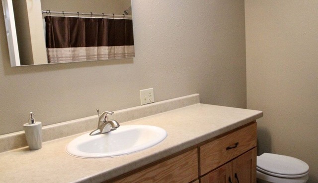 Peaceful and one block from city square!