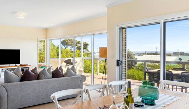 Peaceful Beachside Getaway with Two Living Areas – Sleeps 9